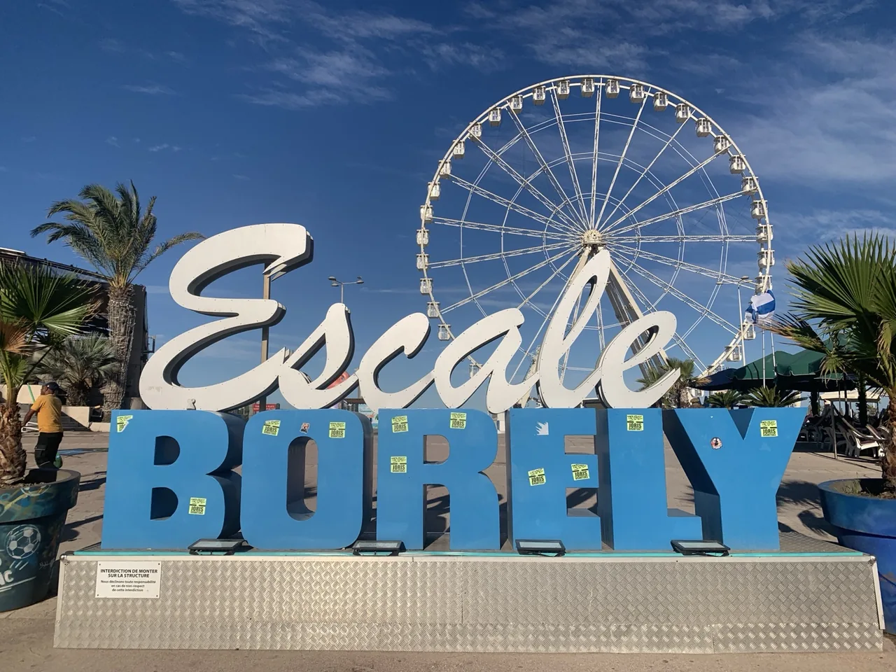 Repère Escale Borély avec la grande roue en arrière-plan